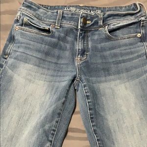 AE kick boot light wash cool toned jeans